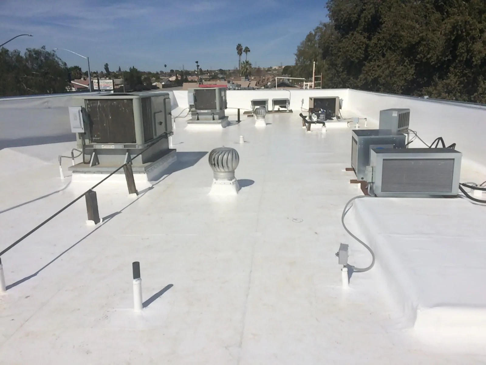 Occupied Building Reroofing in Corona, CA